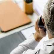Business man on phone at a desk