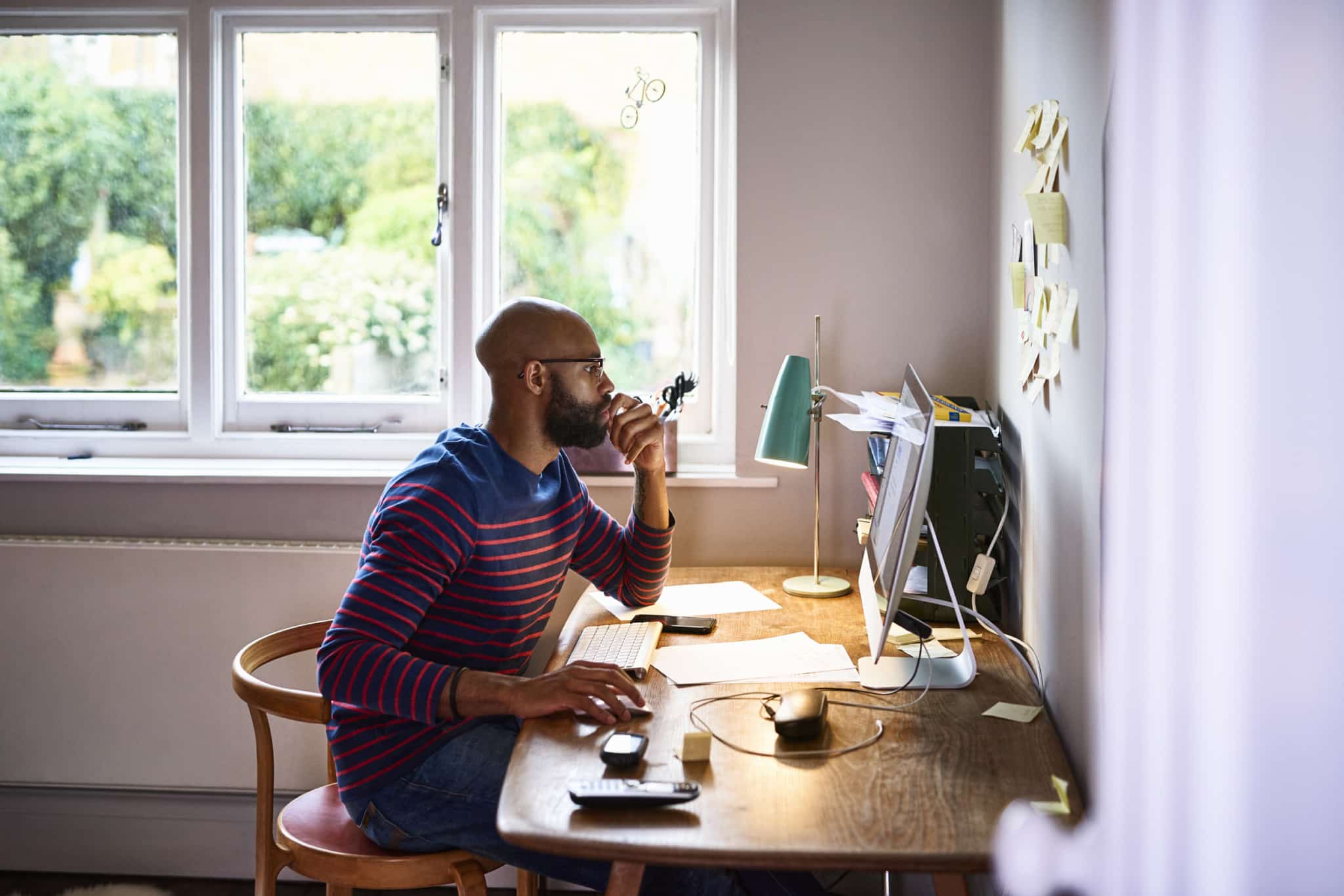 African american male working at desktop