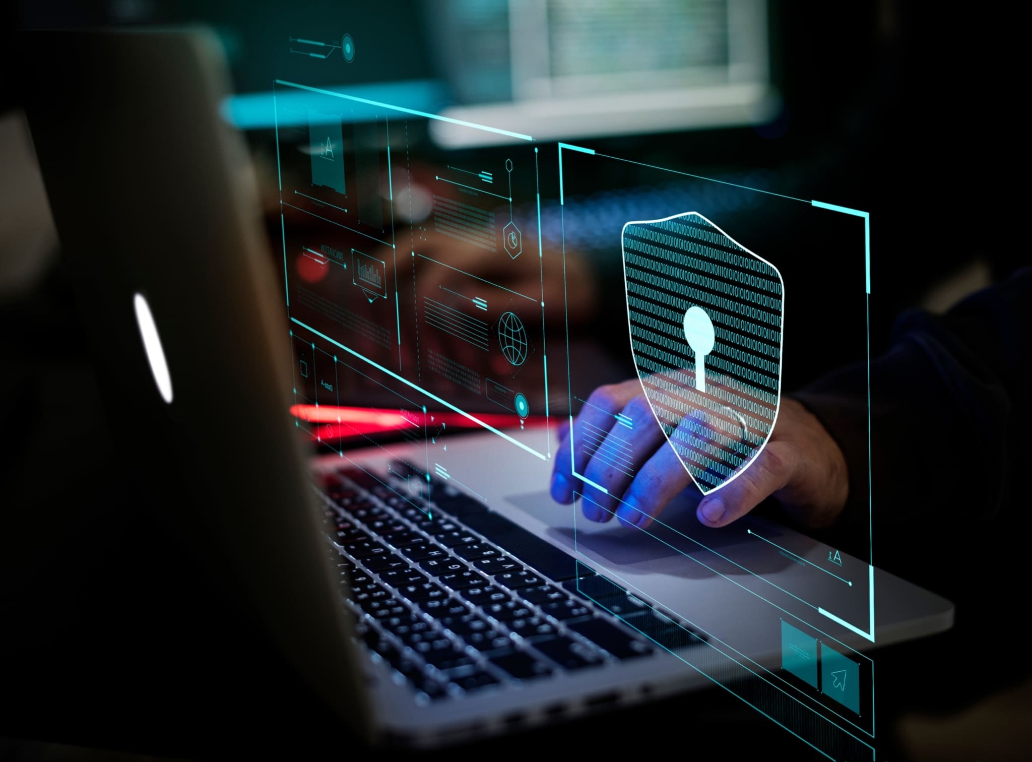 man typing on Laptop with holograph lock screen
