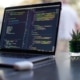 laptop on desk - SIEM as a Service