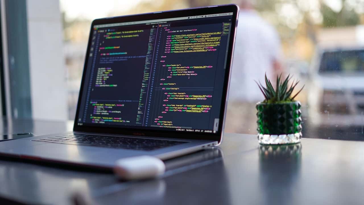 laptop on desk - SIEM as a Service