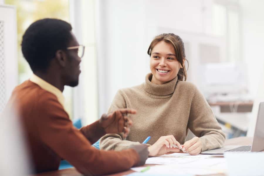 Business man and business woman collaborating