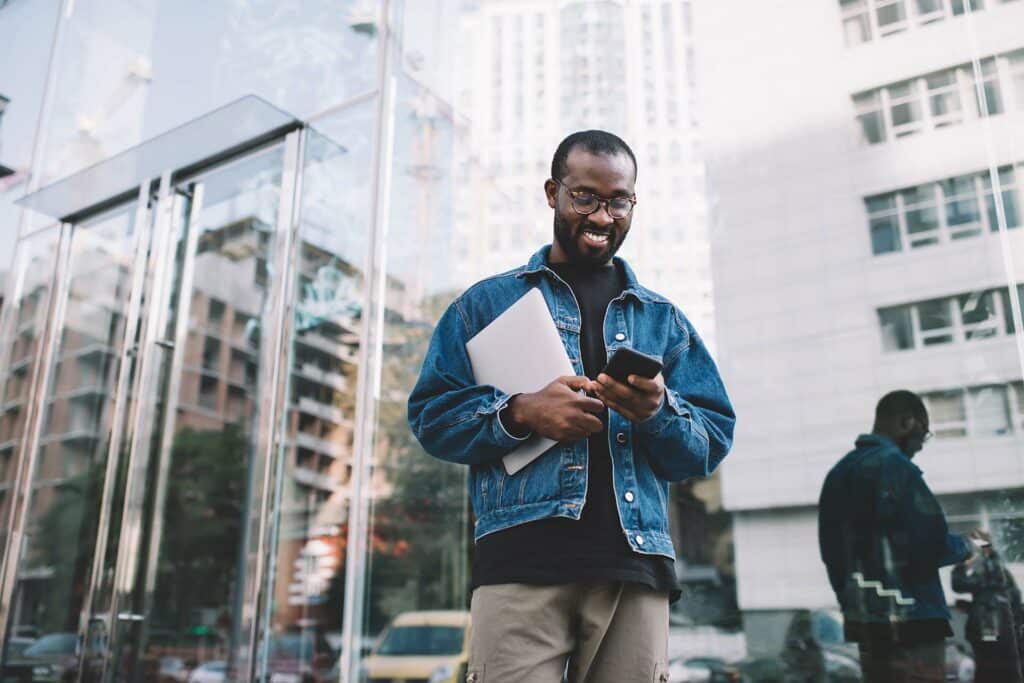 IT specialist using their phone on the go