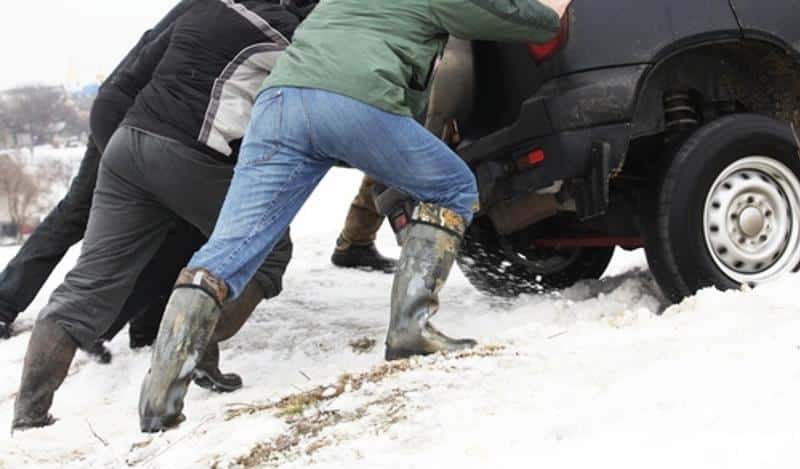 Pushing cars in the snow is no fun, invest in salt and sand now. 